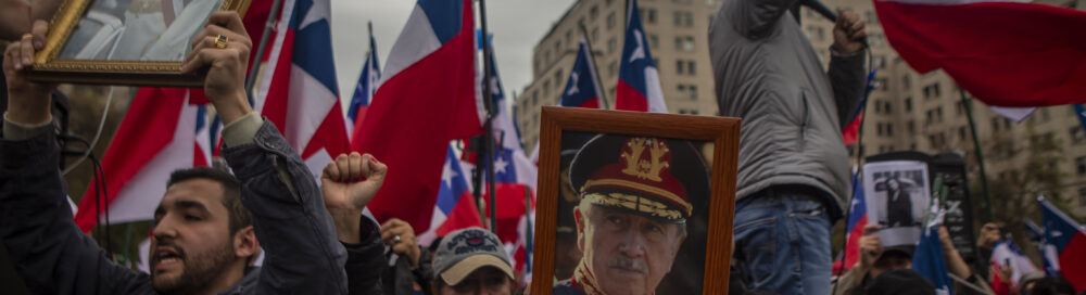 Far-right groups gather in front of La Moneda presidential palace on 9 September 2023 in Santiago de Chile to celebrate the 1973 coup d'etat