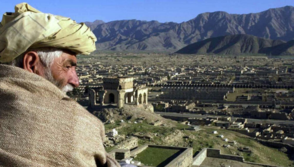 A man looking over Kabul, Afghanistan.